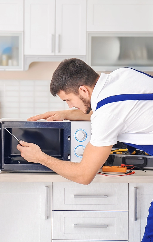 https://primeappliancerepairs.com/wp-content/uploads/2023/08/microwave-repair-technicians.webp